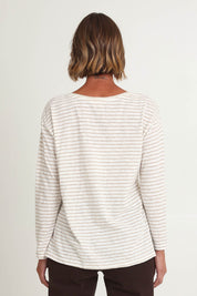 Model Riina wearing size S of the City Stripe Tee in colour Naturivory, from the back