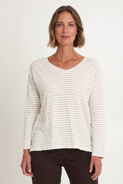 Model Riina wearing size S of the City Stripe Tee in colour Naturivory, from the front, cropped image