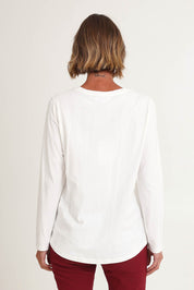 Model Riina wearing size S of the Sweetheart Tee in colour Ivory (White), from the back