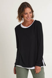Model Riina wearing size S of the Alicia 2 In 1 Top in colour Black (Black), from the front, cropped image