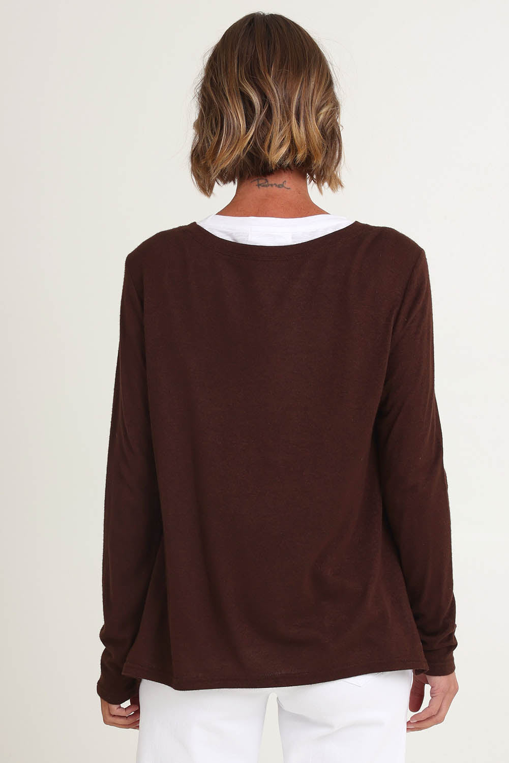 Model Riina wearing size S of the Alicia 2 In 1 Top in colour Coffee, from the back