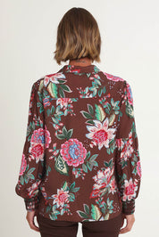 Model Riina wearing size S of the Bouquet Print Shirt in colour Chocolate, from the back