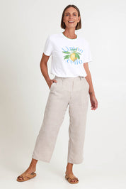 Model Riinar wearing size 10 of the Urban Stripe Pant – Natural in colour Natural, from the front