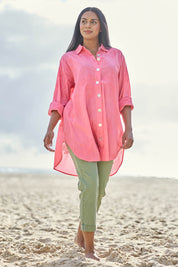 Model Eshan wearing size 10 of the Lagoon Palm Shirt – Raspberry in colour Raspberry, from the front