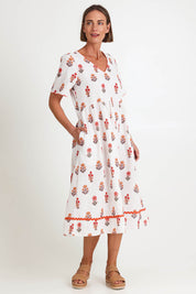 Model Riinar wearing size 10 of the Candelabra Flower Dress – Natural in colour Natural, from the front