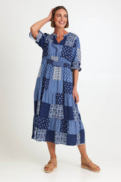Model Riinar wearing size 10 of the Costa Mesa Print Dress – Navy in colour Navy, from the front