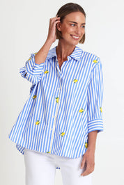 Model Riinar wearing size 10 of the Spritz Stripe Shirt – Bluewhite in colour Bluewhite, in a cropped view