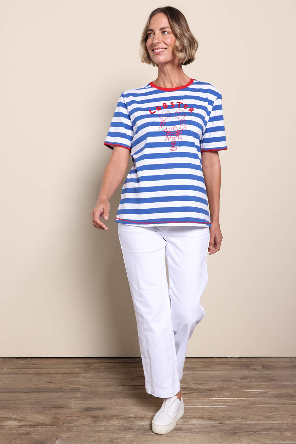 Model Riinar wearing size 10 of the Rhode Island Stripe Tee – Azure in colour Azure, from the front