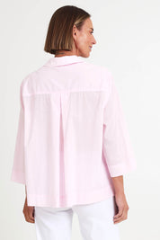 Model Riinar wearing size 10 of the Costa Mesa Cotton Shirt - Palepink in colour Palepink, from the back