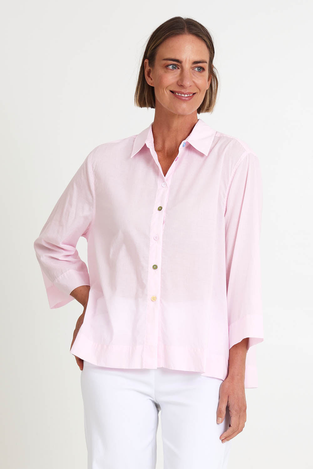 Model Riinar wearing size 10 of the Costa Mesa Cotton Shirt - Palepink in colour Palepink, in a cropped view