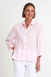 Model Riinar wearing size 10 of the Costa Mesa Cotton Shirt - Palepink in colour Palepink, in a cropped view