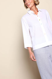 Model Riinar wearing size 10 of the Costa Mesa Cotton Shirt - White in colour White, from an angle