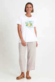 Model Riinar wearing size 10 of the Limoncello Tee – White in colour White, from the front