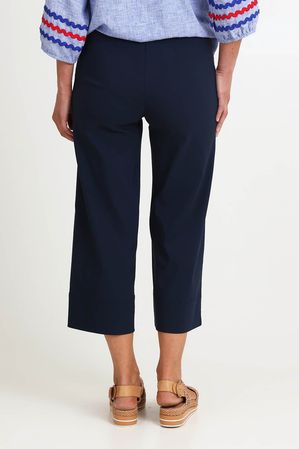 Model Riinar wearing size 10 of the Zara Wide Leg Pant - Navy in colour Navy, from the back