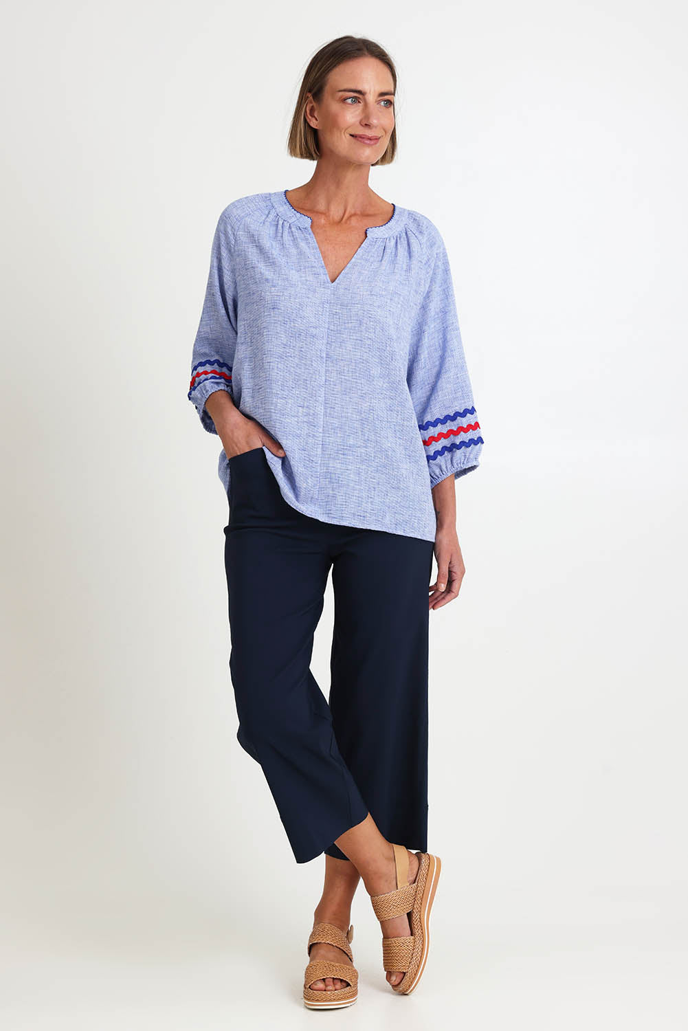 Model Riinar wearing size 10 of the Zara Wide Leg Pant - Navy in colour Navy, from the front