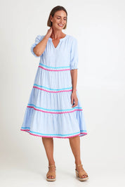 Model Riinar wearing size 10 of the Canopy Ric Rac Dress – Paleblue in colour Paleblue, from the front