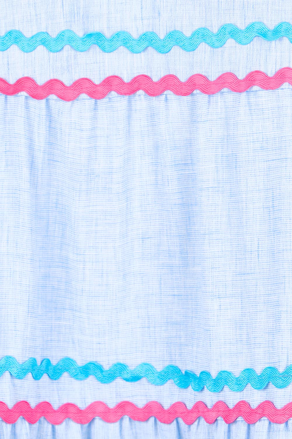 Product shot of the Canopy Ric Rac Dress – Paleblue in colour Paleblue, showing detail