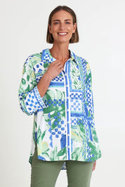 Model Riinar wearing size 10 of the Limoncello Print Shirt – Apple in colour Apple, in a cropped view