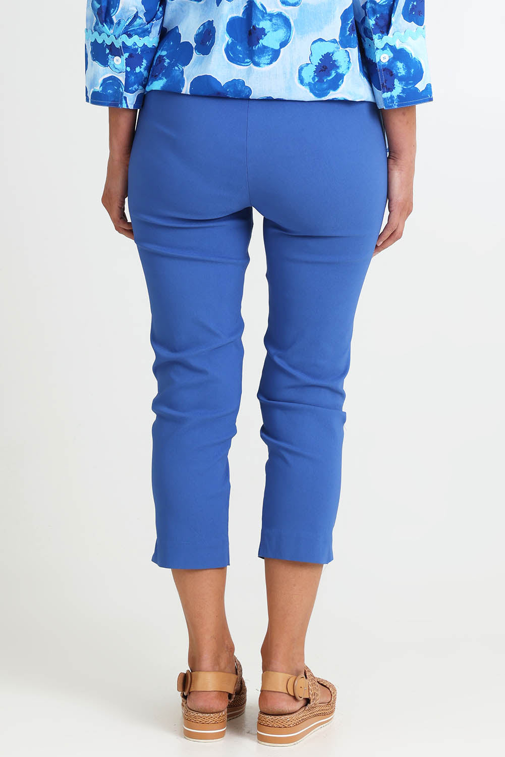 Model Riinar wearing size 10 of the Zara Pant - Blue in colour Blue, from the back