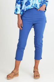 Model Riinar wearing size 10 of the Zara Pant - Blue in colour Blue, in a cropped view