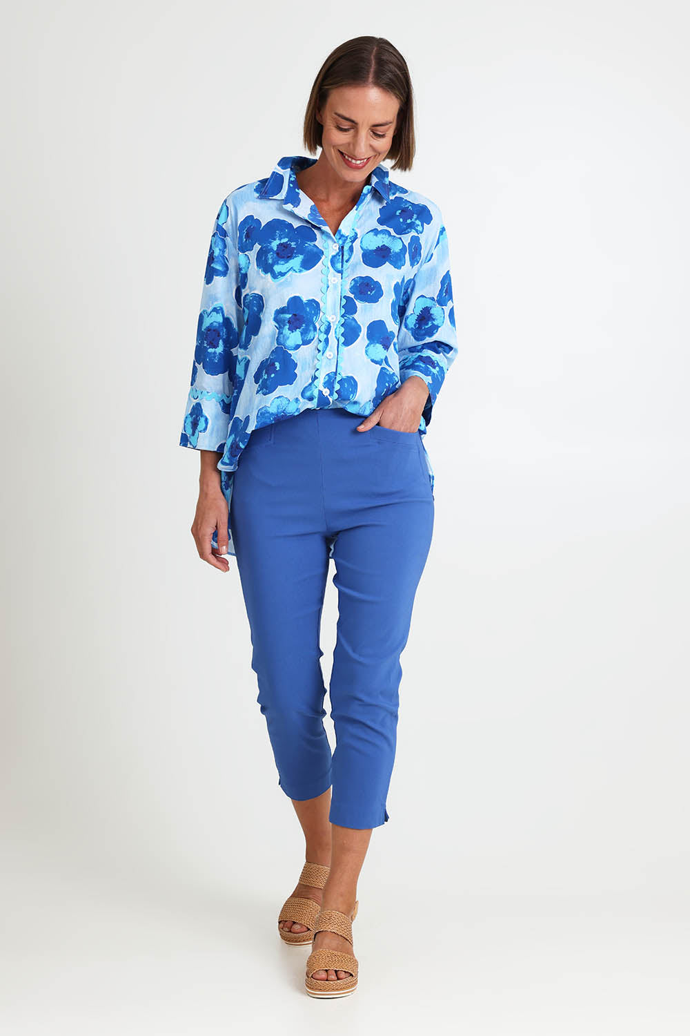 Model Riinar wearing size 10 of the Zara Pant - Blue in colour Blue, from the front