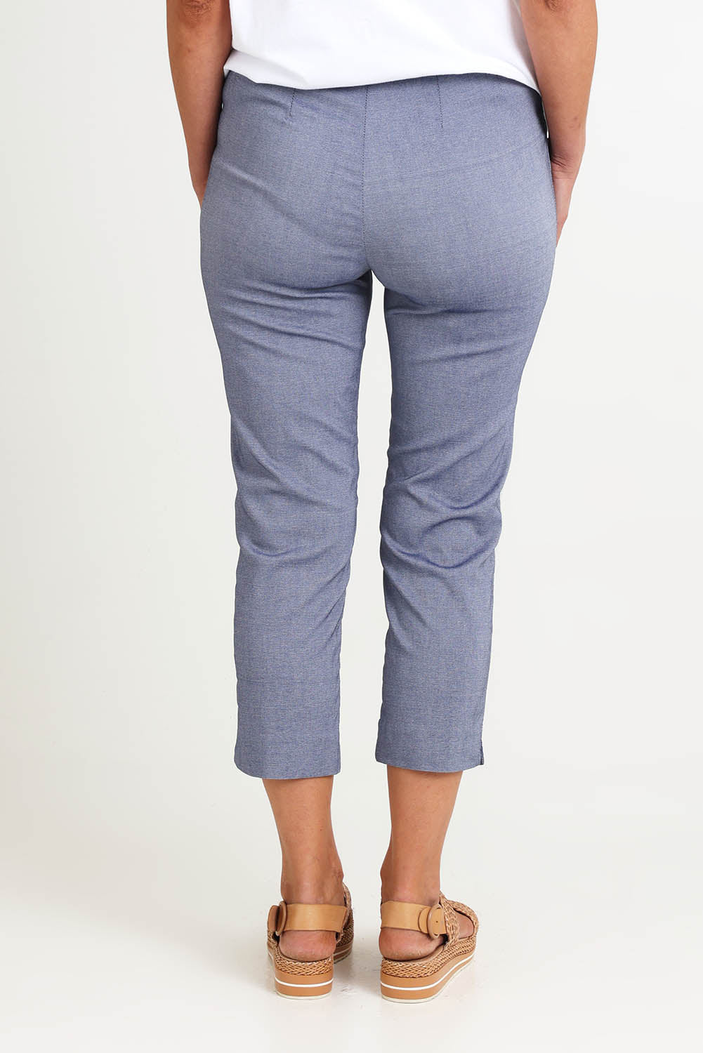 Model Riinar wearing size 10 of the Zara Pant - Denim in colour Denim, from the back