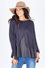 Model Gemma wearing size S of the Triangle Detail Long Sleeve Tee in colour Navy (Blue), from the front, cropped image