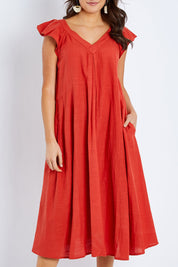 Model Elhana wearing size S of the Vin colourNeck Maxi Dress - Guava (Red), from the front, cropped image