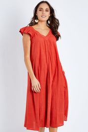 Model Elhana wearing size S of the Vin colourNeck Maxi Dress - Guava (Red), from the front, cropped image