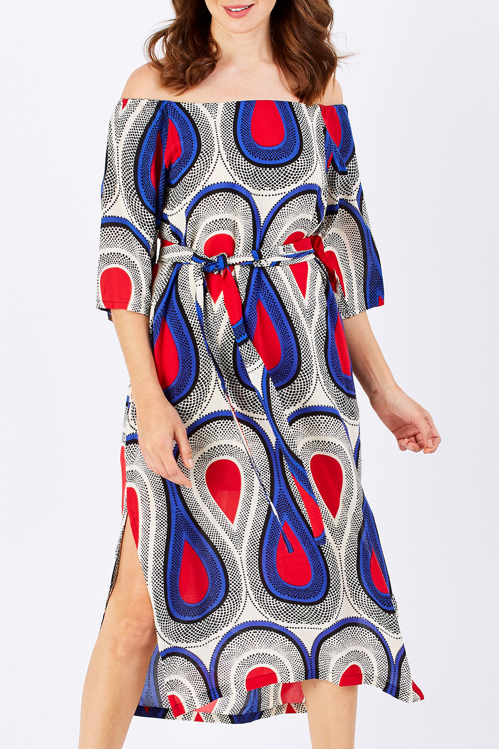 Model Rebecca wearing size 2 of the Hosta Dress in colour NemaBlue (Blue), from the front, cropped image