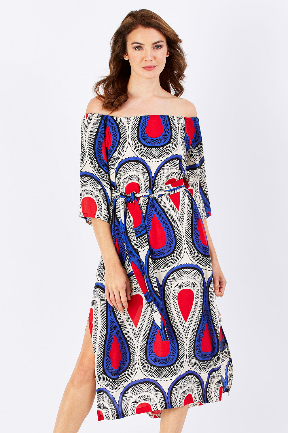 Model Rebecca wearing size 2 of the Hosta Dress in colour NemaBlue (Blue), from the front, cropped image