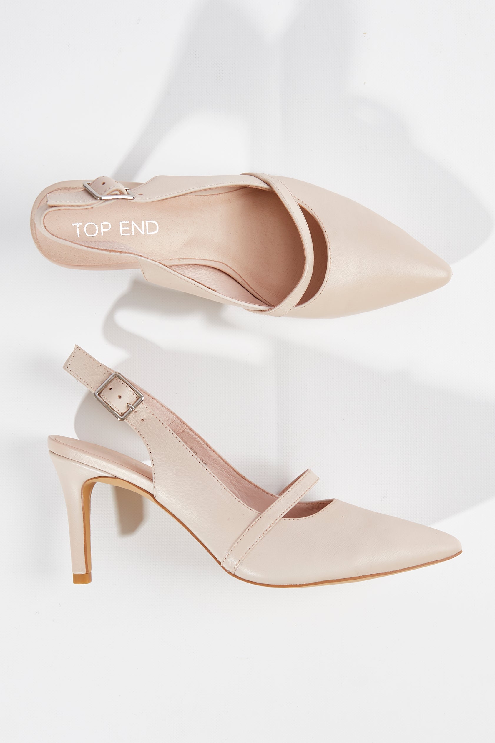 A model wearing size 37 of the Blato Leather Heel in colour Palepink (Pink), from the front, showing the whole outfit