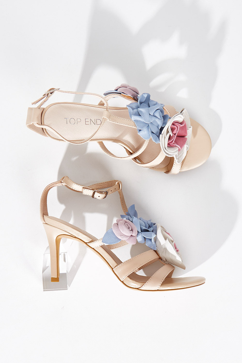 A model wearing size 37 of the Nouse Suede Heel in colour Pastel, from the front, showing the whole outfit