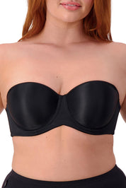 A model wearing the Beautiful Silhouette Bra in colour Black (Black), from the front, cropped image