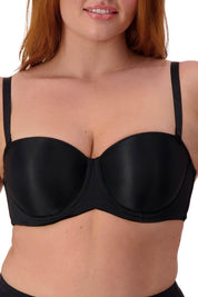 A model wearing the Beautiful Silhouette Bra in colour Black (Black), from the front, cropped image