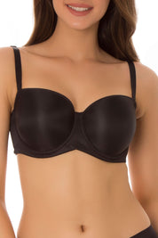 A model wearing the Beautiful Silhouette Bra in colour Black (Black), from the front, cropped image