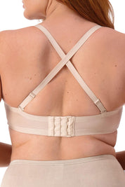 A model wearing the Beautiful Silhouette Bra in colour Teint, from the back