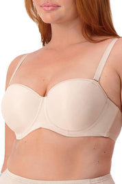 A model wearing the Beautiful Silhouette Bra in colour Teint, from the front, cropped image