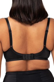 A model wearing the Lacy Minimizer Bra in colour Black (Black), from the back
