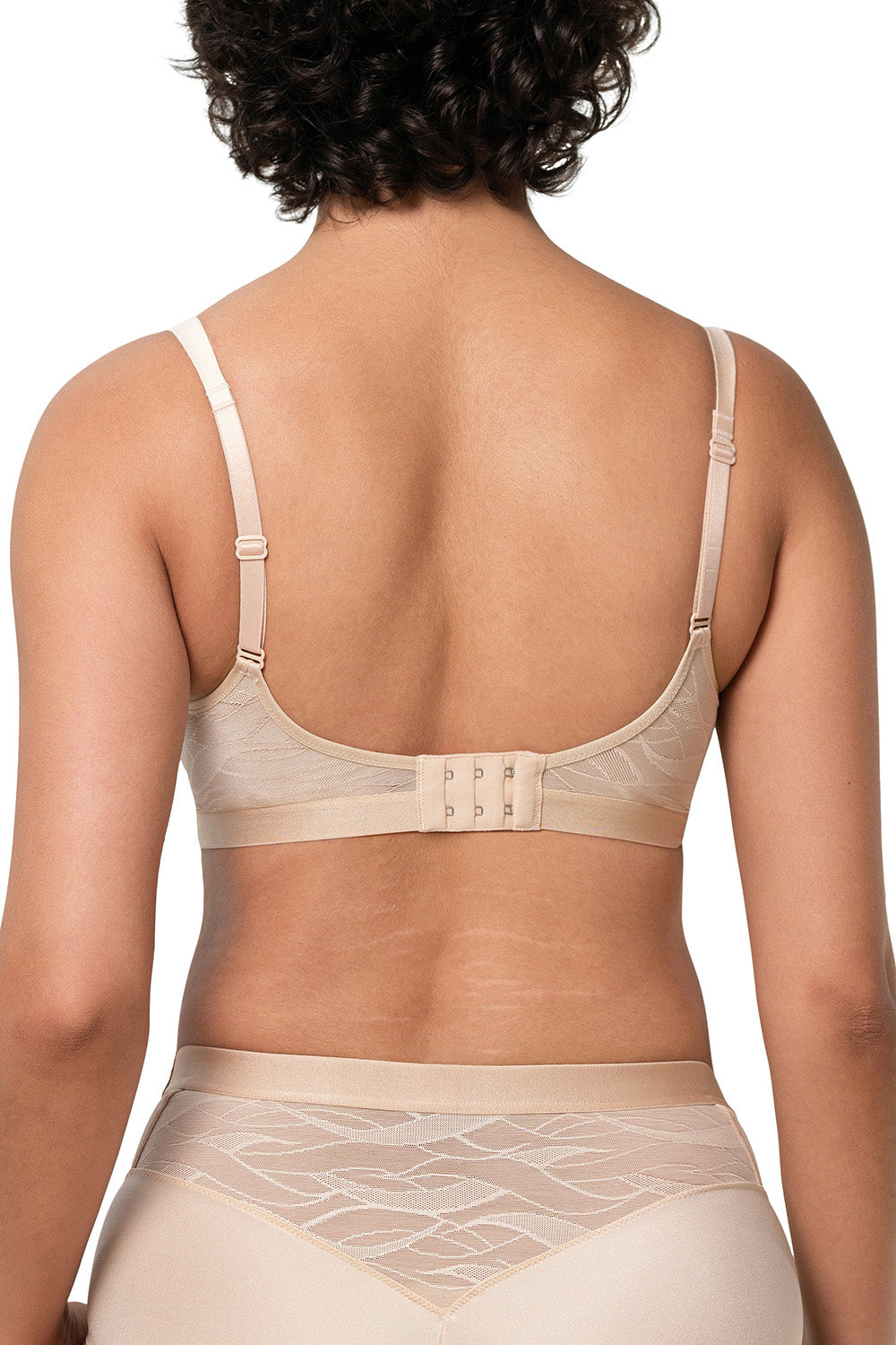 A model wearing the Shape Minimiser Airy Sensation Bra in colour Nudebeige, from the back