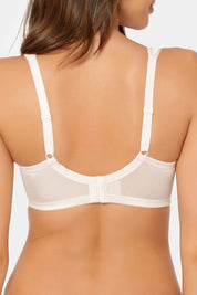 A model wearing the Endless Comfort Wired Bra in colour Freshpowde, from the back