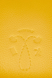 Product shot of the Small Leather Crossbody Bag in colour Mustard, detail
