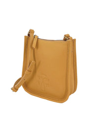 Product shot of the Small Leather Crossbody Bag in colour Mustard, from the front