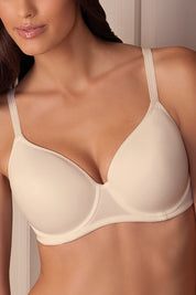 A model wearing the Pure Luxury Gorgeous Bra in colour Teint, from the front, cropped image