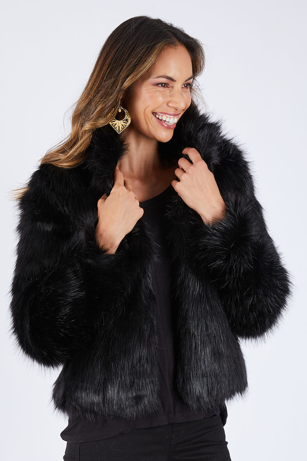 Model Amanda wearing size S of the Fur Delicious Jacket in colour Black (Black), from the front, cropped image