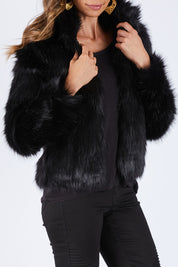 Model Amanda wearing size S of the Fur Delicious Jacket in colour Black (Black), from the front, cropped image