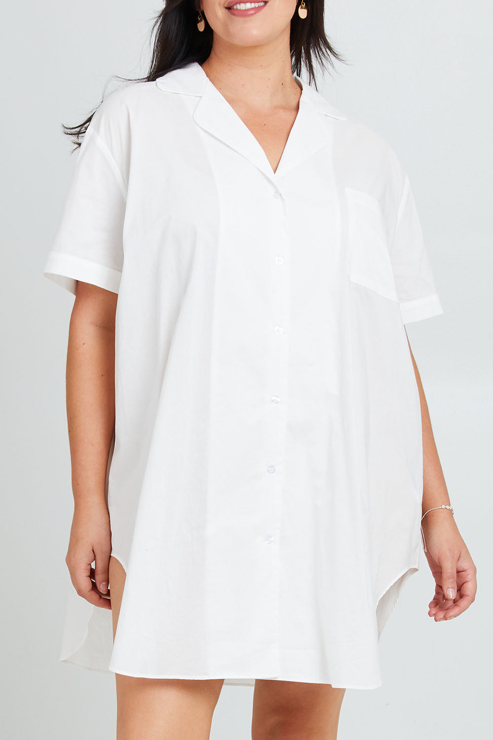 Model Poppy wearing the Cotton Short Sleeve Sleep Shirt in colour Milkwhite (White), from the front, cropped image