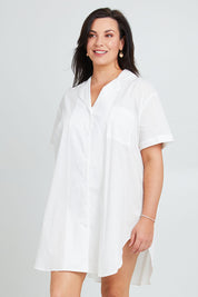 Model Poppy wearing the Cotton Short Sleeve Sleep Shirt in colour Milkwhite (White), from the front, cropped image