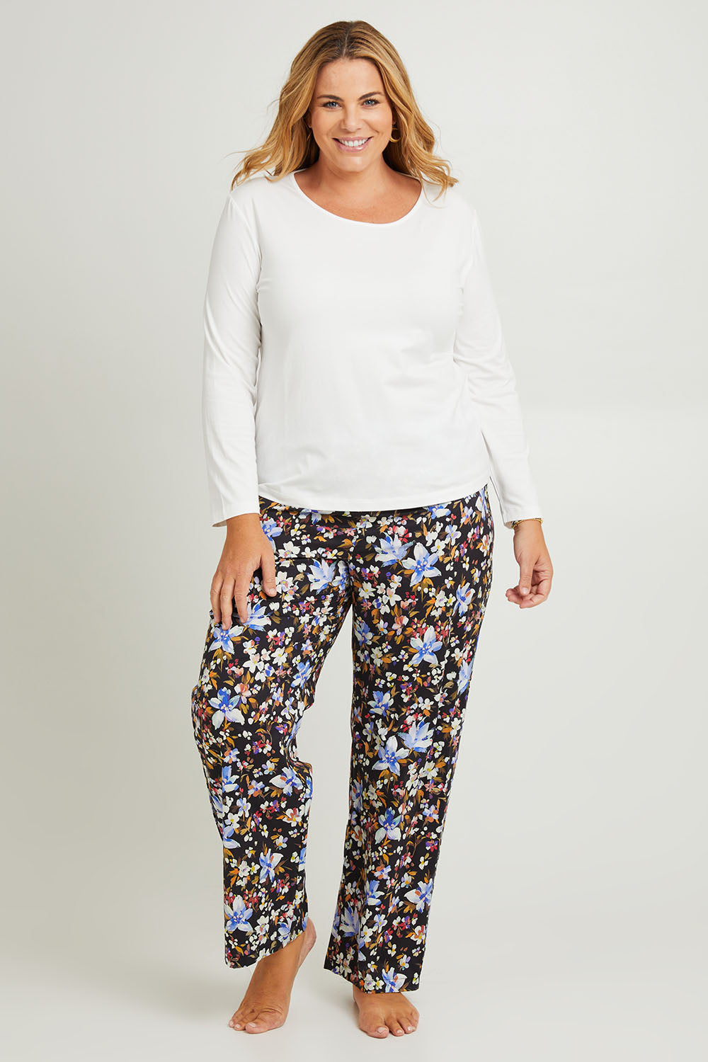 Model Fiona wearing the Winter Solstice Mercerised Cotton PJ Pants in colour Solstice (Black), from the front, showing the whole outfit