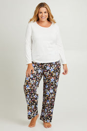 Model Fiona wearing the Winter Solstice Mercerised Cotton PJ Pants in colour Solstice (Black), from the front, showing the whole outfit